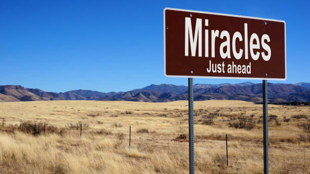 istock Miracles Just Ahead  brown road sign 1016497502