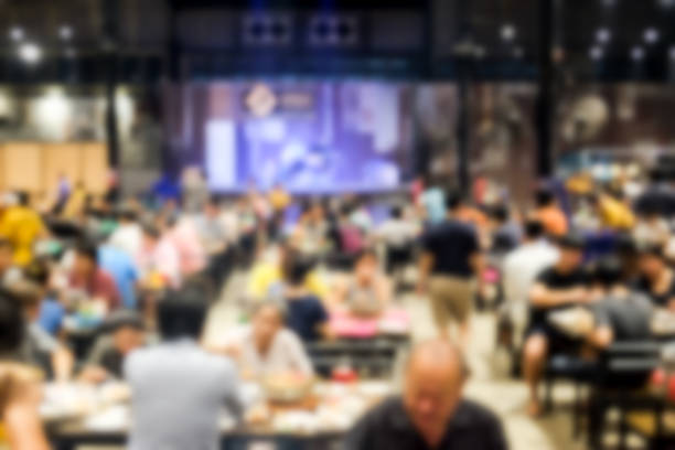 istock Abstract of blurred buffet restaurant with full people 1016497544