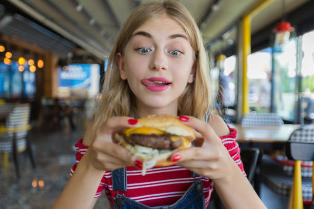 istock Young hungry woman 1016498626