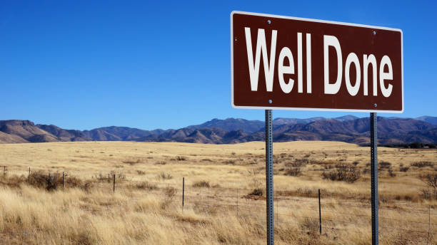 istock Well Done road sign with blue sky 1016501010