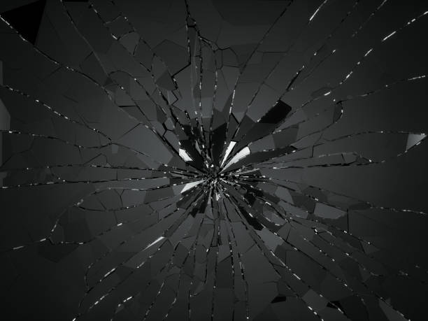 istock Bullet hole and pieces of shattered or smashed glass 1016501350