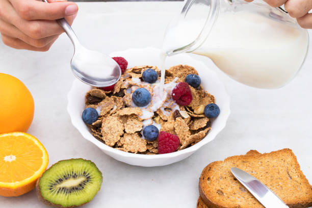 istock healthy breakfast with cereals and fruits, full breakfast 1016501438