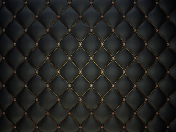 istock Black leather pattern with golden wire and diamonds. Bumped background 1016505290