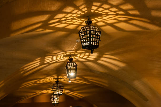istock Antique lamps (chandeliers) in the cave dungeon 1016505300
