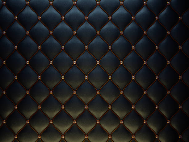 istock Black leather pattern with golden wire and diamonds. Bumped background 1016505334
