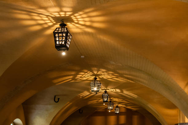 istock Antique lamps (chandeliers) in the cave dungeon 1016510250