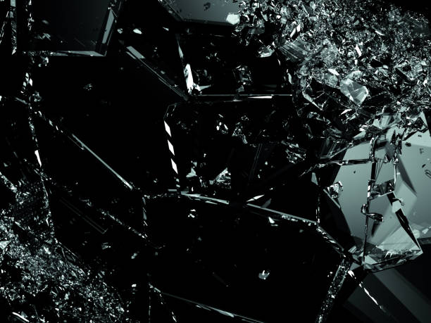istock Shattered glass isolated on black background 1016510838