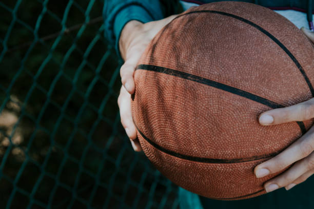 istock young athlete with basketball 1016513074