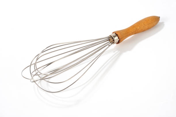 istock old vintage wire whisk isolated over white 1016519678