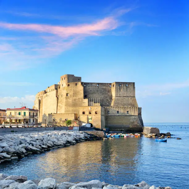Castel dell'Ovo at the Naples habour, Italy. Composite photo
