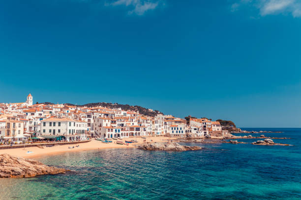 Sea landscape with Calella de Palafrugell, Catalonia, Spain near of Barcelona. Scenic fisherman village with nice sand beach and clear blue water in nice bay. Famous tourist destination in Costa Brava Sea landscape with Calella de Palafrugell, Catalonia, Spain near of Barcelona. Scenic fisherman village with nice sand beach and clear blue water in nice bay. Famous tourist destination in Costa Brava barcelona beach stock pictures, royalty-free photos & images