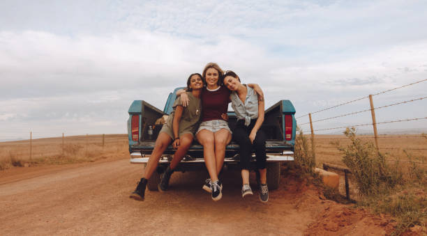 istock Women on a country side road trip 1016537106