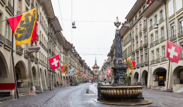Street view of Kramgasse or Grocers Alley. It is one of the principal streets in the Old City of Bern, Switzerland