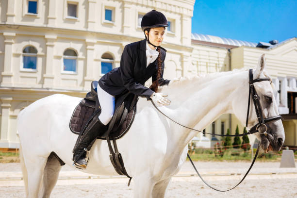 istock Professional experienced female rider training before annual contest 1016541832