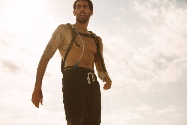 istock Healthy young man against sky 1016547840