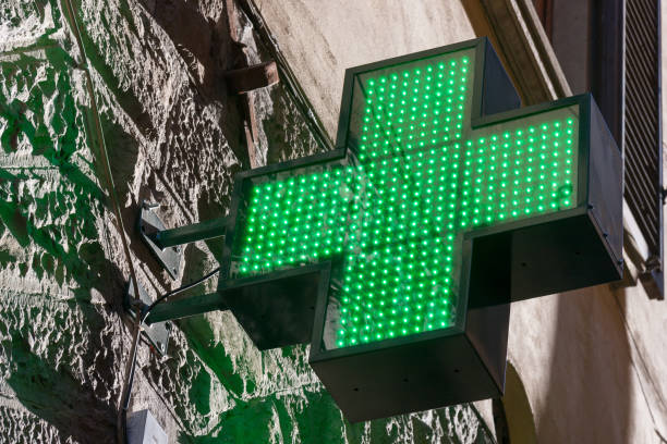 istock Pharmacy Sign in Florence, Italy 1016552066