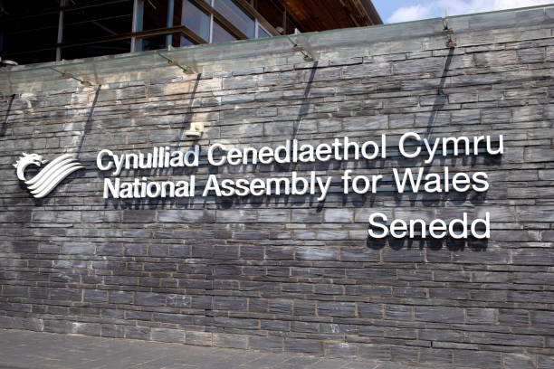 National assembly for Wales signage in Cardiff Bay, Cardiff, Wales Cardiff, Wales - August 4th, 2018: National assembly for Wales signage in Cardiff Bay, Cardiff, Wales national assembly for wales stock pictures, royalty-free photos & images