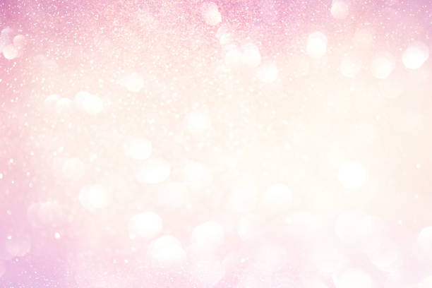 istock Glitter pink lights abstract background, silver and white, defocused 1016559502