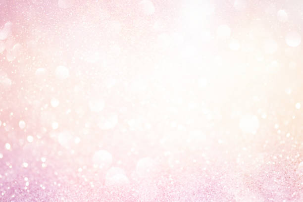 istock Glitter pink lights abstract background, silver and white, defocused 1016559542