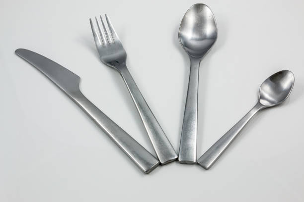 istock Cutlery with knife, fork, table spoon and little spoon 1016565070