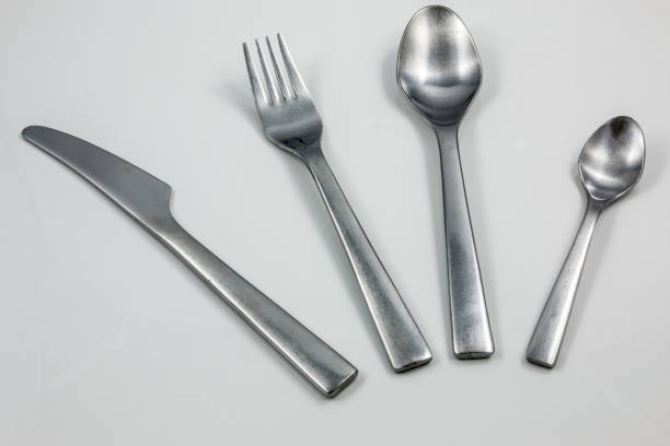 istock Cutlery with knife, fork, table spoon and little spoon 1016565932