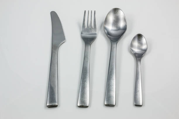 istock Cutlery with knife, fork, table spoon and little spoon 1016567138