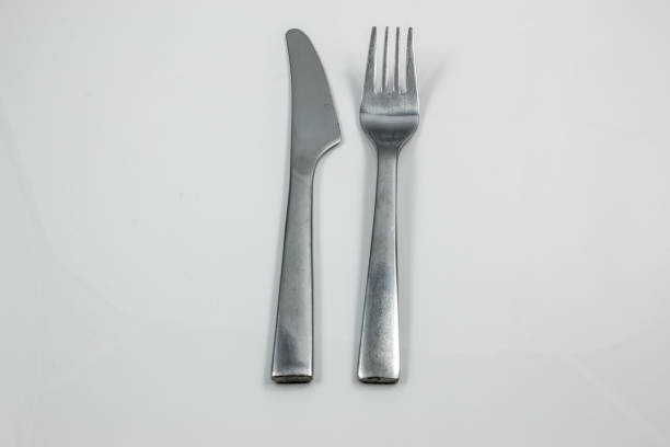 istock Steel cutlery with knife and fork 1016567202