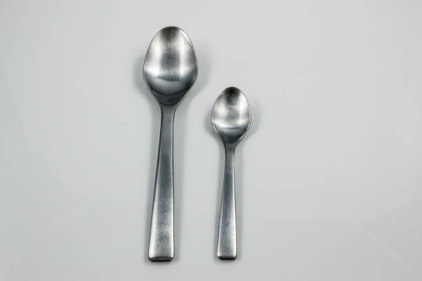 istock Steel cutlery with table spoon and little spoon 1016567258