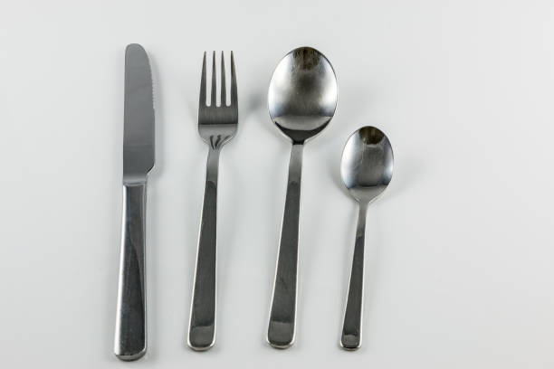 istock Cutlery with knife, fork, table spoon and little spoon 1016567402