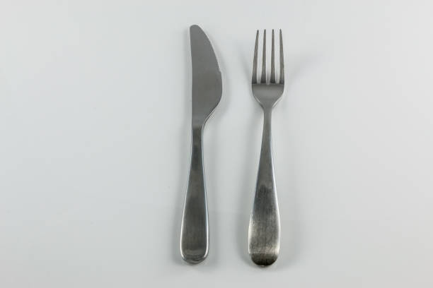istock Steel cutlery with knife and fork 1016567406