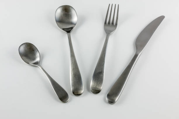 istock Cutlery with knife, fork, table spoon and little spoon 1016567450