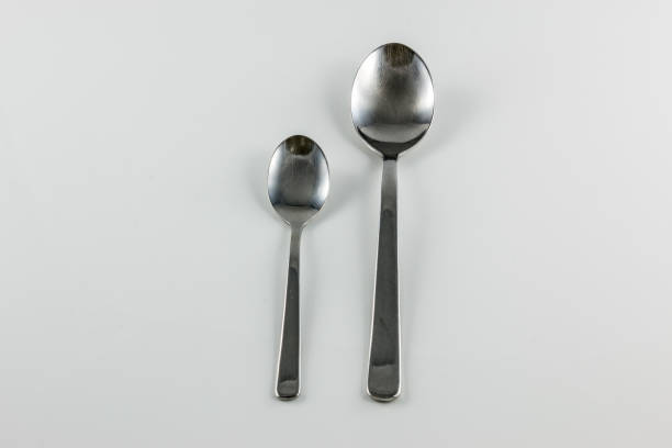 Steel cutlery with table spoon and little spoon