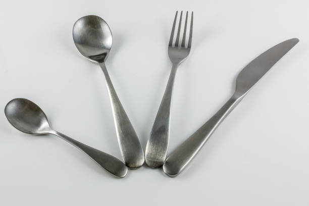 istock Cutlery with knife, fork, table spoon and little spoon 1016567508