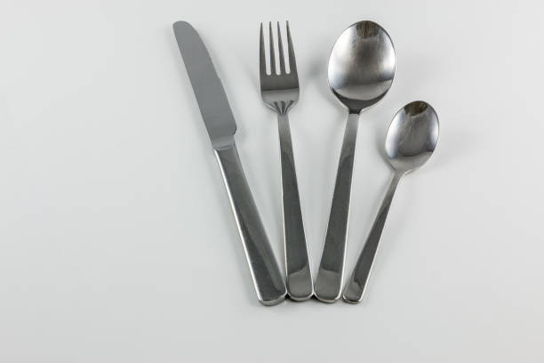 istock Cutlery with knife, fork, table spoon and little spoon 1016567646