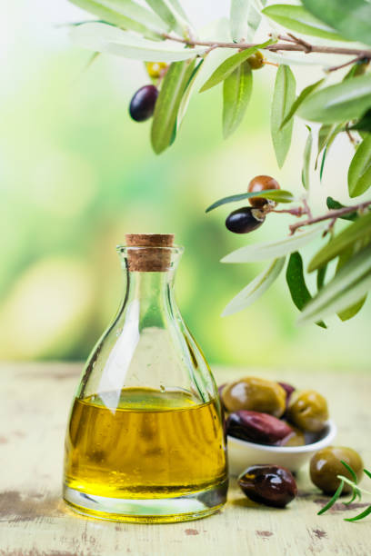 istock Olive oil in a glass bottle 1016567876