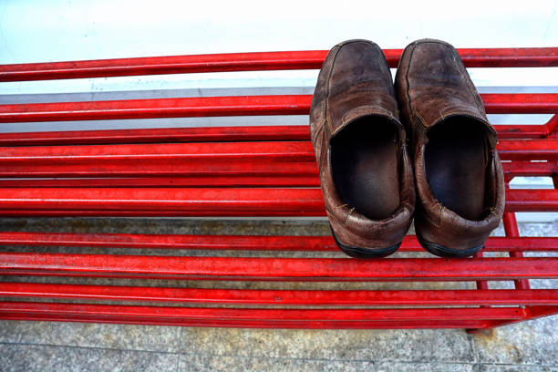 old leather shoes on the shoe rack