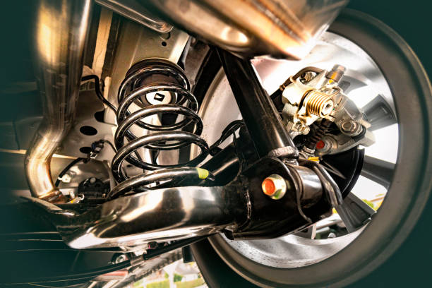 Shock absorber brake suspension under the new car . shock absorber stock pictures, royalty-free photos & images