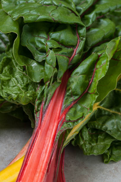 istock Fresh leaves of chard (salad chard) close-up. 1016577554
