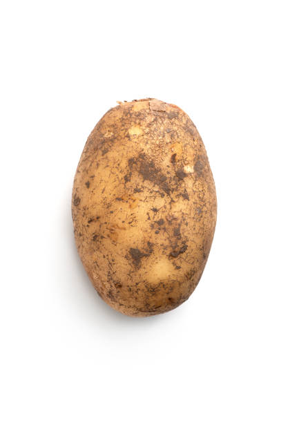 istock Potatoes in peel close-up isolated on white background. 1016577716