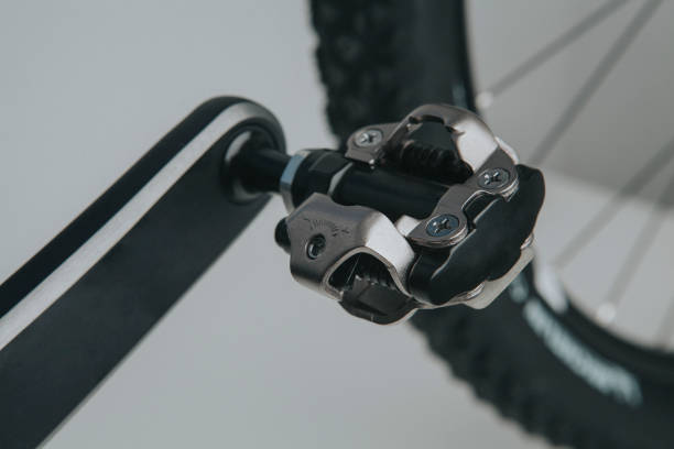 Close up of SPD bicycle pedal. Detailed view of mountain bike automatic SPD pedal in a brand new bike. german social democratic party photos stock pictures, royalty-free photos & images
