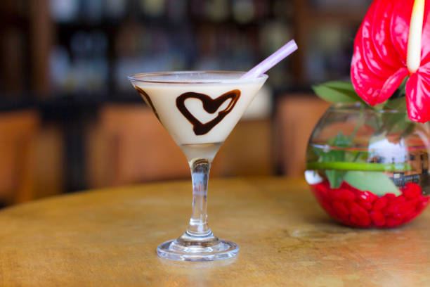 istock Cocktail with a chocolate heart and pink straw 1016582102