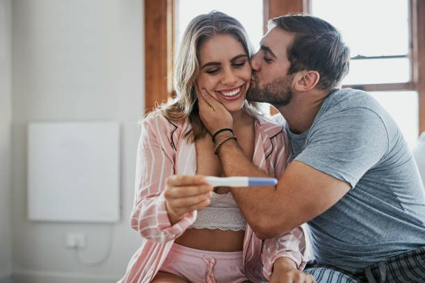 You'll be a great mother Shot of a young couple looking at the result on a home pregnancy test mum new boyfriend stock pictures, royalty-free photos & images