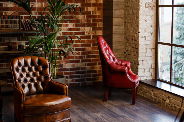 istock Interior design with luxurious vintage style sofa, armchair and table 1016586438