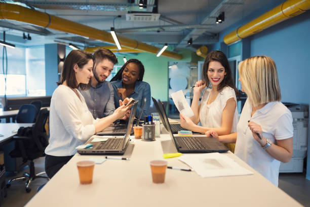 istock Young coworkers in modern office 1016589774