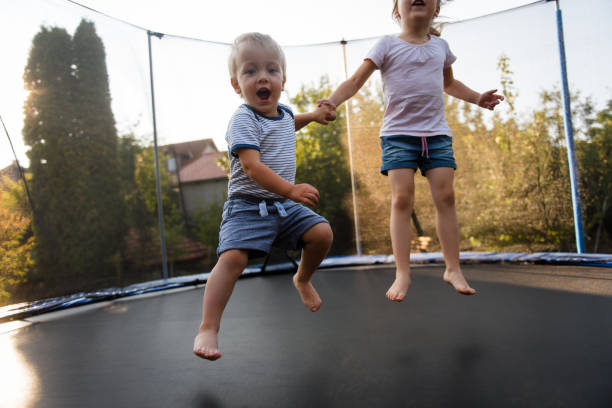 istock Little kids having fun in backyard 1016602052
