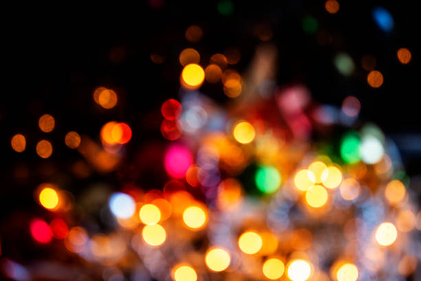 дефокусные рождественские огни фоны - party lights стоковые фото и изображения