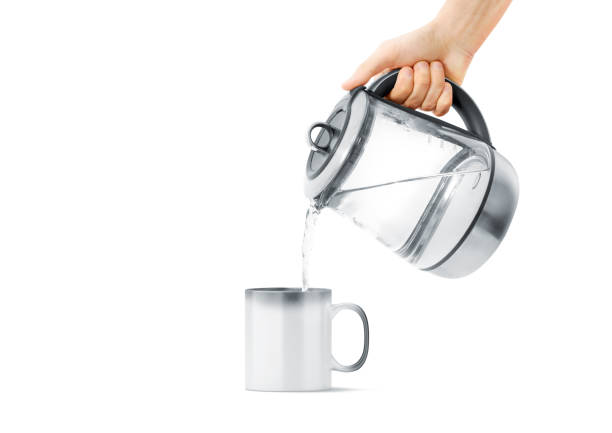 istock Blank magic mug filling with teapot mock up, isolated 1016611610