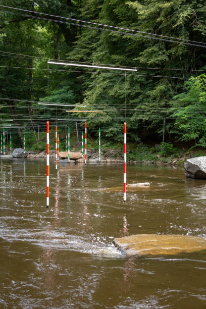 Whitewater or canoe slalom court FRANCE, UZERCHE - JULY 12, 2018: Whitewater or canoe slalom court wildwater stock pictures, royalty-free photos & images