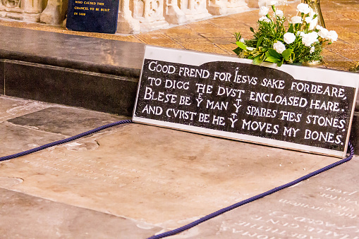 STRATFORD-UPON-AVON, UK - JUNE 8, 2015: The grave of famous English playwright and poet William Shakespeare, located in the Church of the Holy Trinity