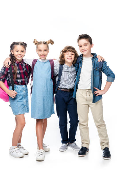 istock schoolchildren hugging and looking at camera isolated on white 1016623538